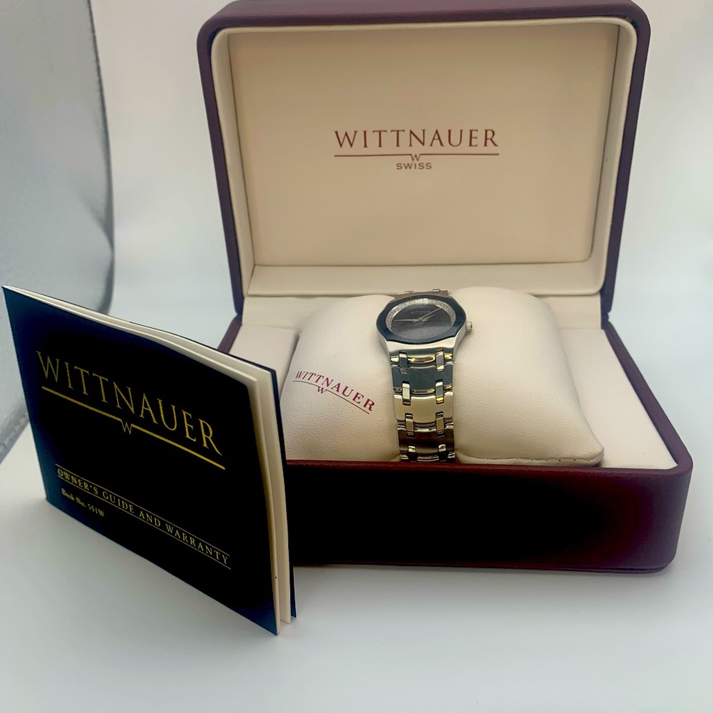 Wittnauer ladies stainless steel quartz wrist watch with 46 diamonds.